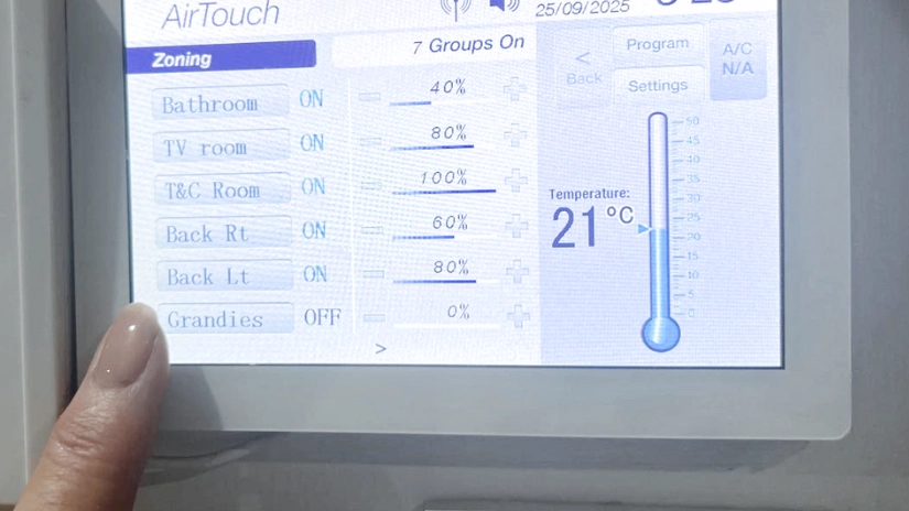 zone control unit for ducted air conditioning with finger pointed to zone that is off for COYCO